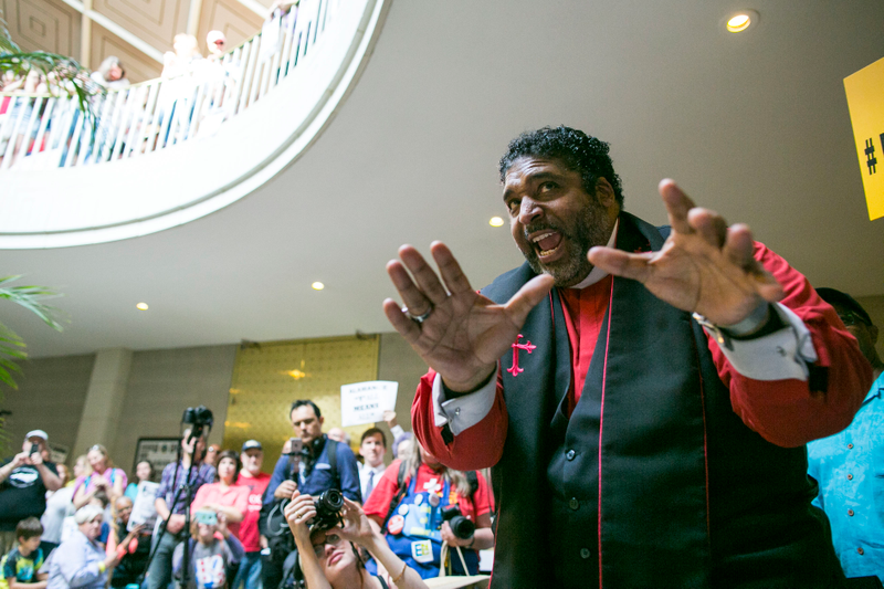 North Carolina NAACP President William Barber speaks after several people were arrested at the North Carolina state legislative building as they voiced their concerns over House Bill 2, in Raleigh, N.C., on May 16, 2016. House Bill 2, also known as the Bathroom Bill, requires transgender people to use the public restroom matching the sex on their birth certificate. AL DRAGO/CQ ROLL CALL